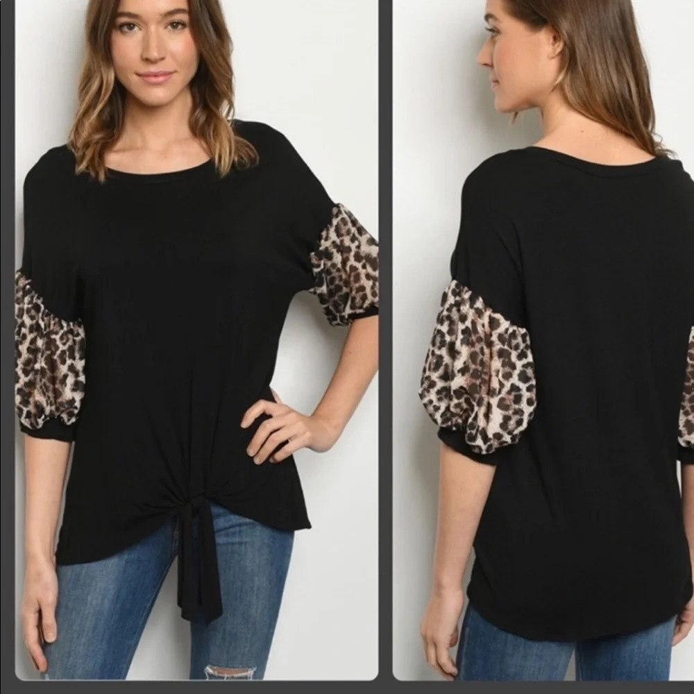 Black top with leopard sleeves new without tags.